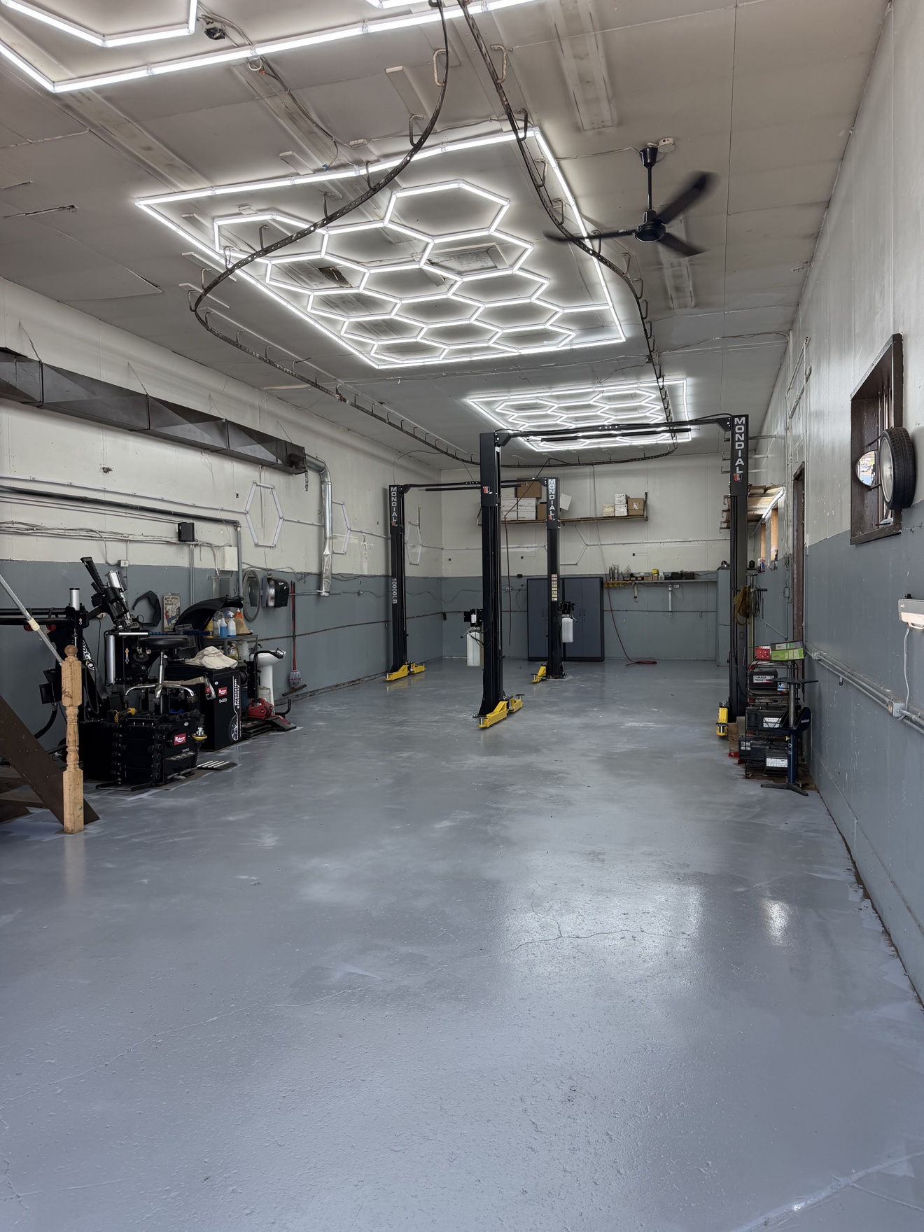 Inside the Marin Autohaus service shop with vehicle lifts